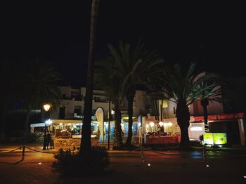 Illuminated street light at night