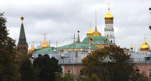 View of buildings in city against sky