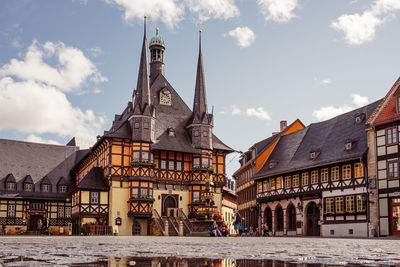 Exterior of buildings against sky in city