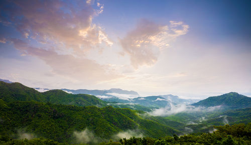 Scenic view of mountains against sky during sunset