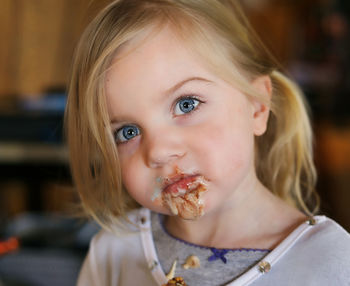 Close-up portrait of smiling girl