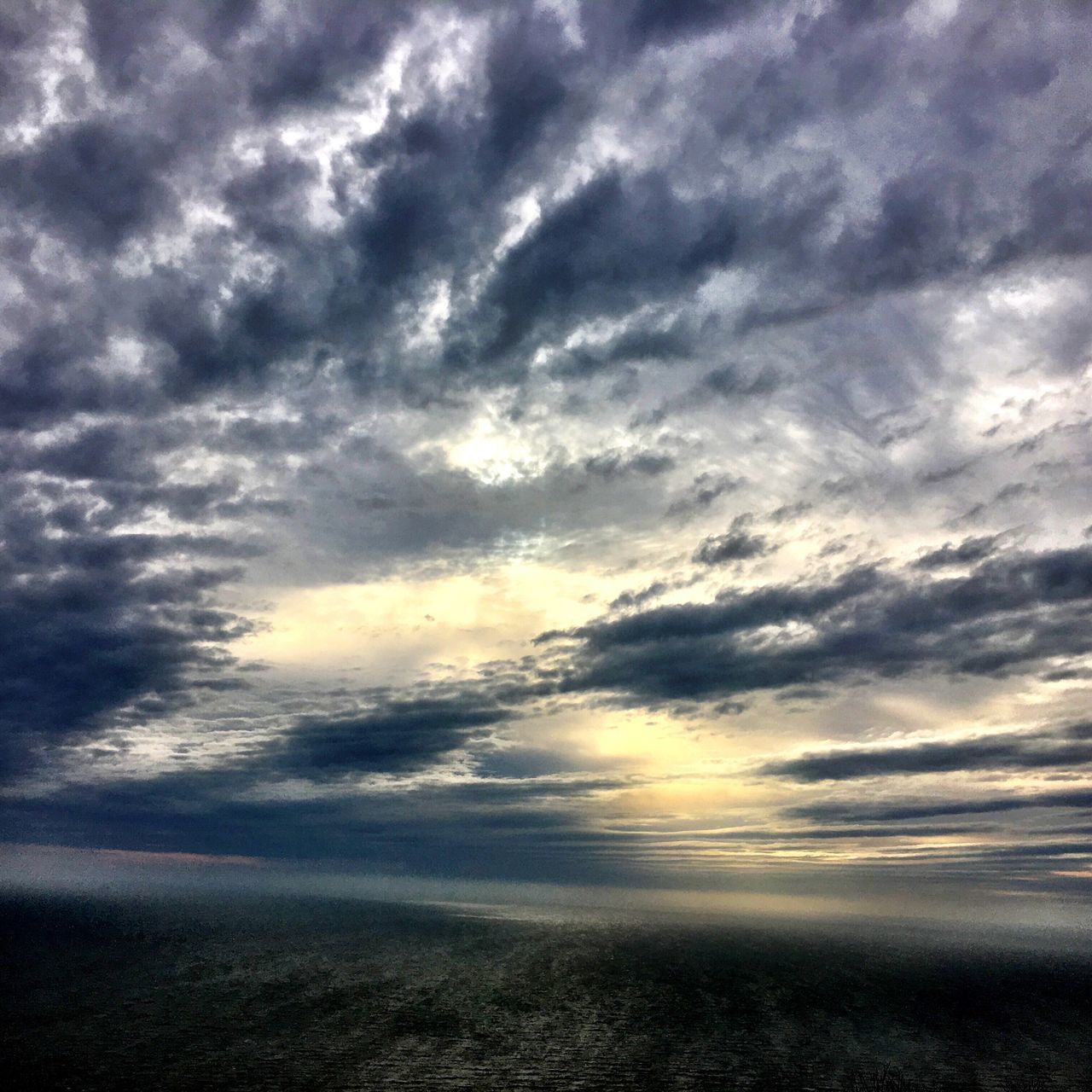 sea, water, horizon over water, scenics, tranquil scene, beauty in nature, tranquility, idyllic, nature, sunset, waterfront, calm, cloud - sky, sky, cloud, cloudy, majestic, cloudscape, outdoors, remote, ocean, seascape, dramatic sky, no people, atmospheric mood, non-urban scene, shore