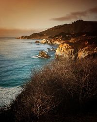 Scenic view of sea against sky during sunset