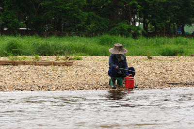 Thailand fisherman in mekong river