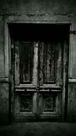 Closed wooden door of house