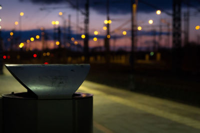 Close-up of illuminated lamp at night