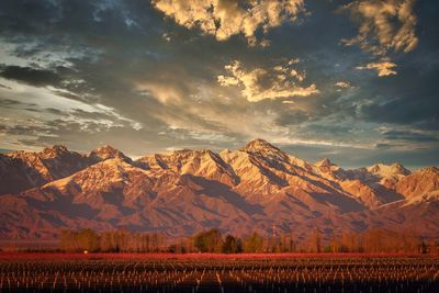 Scenic view of mountains against sky during sunset