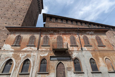 Low angle view of old building against sky