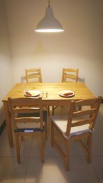 Empty chairs and tables in restaurant