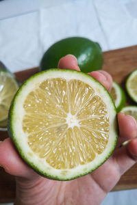 Close-up of hand holding fruit