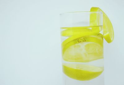 Yellow drink against white background