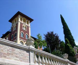 Low angle view of building against clear blue sky