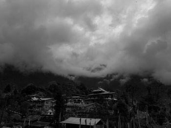 High angle view of townscape against cloudy sky