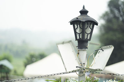 Low angle view of street light against sky