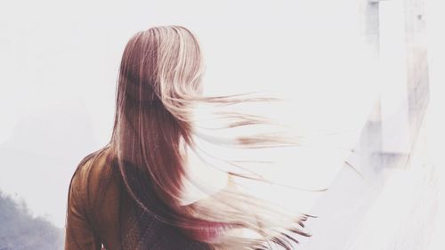 Rear view of woman with long hair