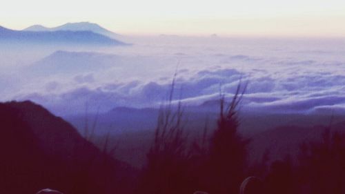 Scenic view of mountains against sky during sunset