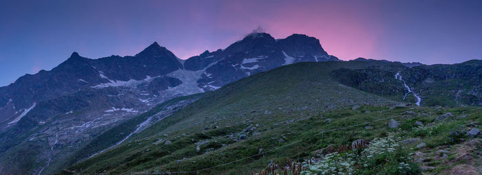 Scenic view of mountains against sky during sunset