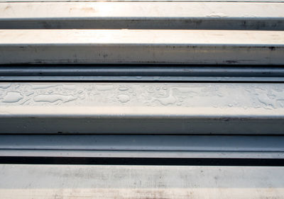 Close-up of text on metal grate