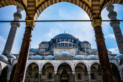 Low angle view of mosque against sky