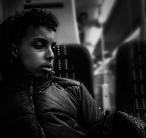 Portrait of young man looking away