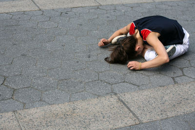 Girl relaxing on ground