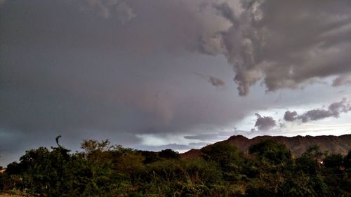 Storm clouds over landscape