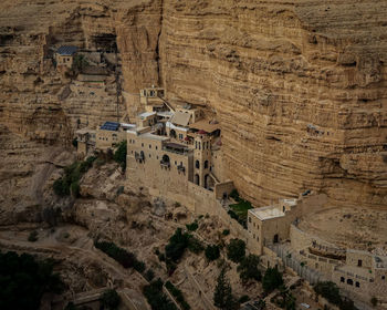 High angle view of tourists on rock