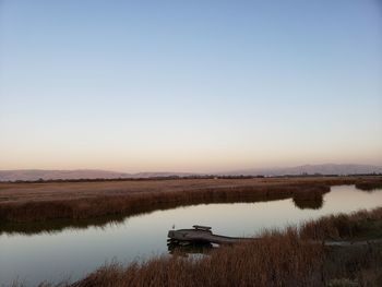 Scenic view of lake against clear sky