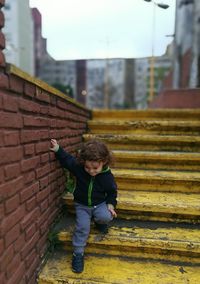 Boy standing outdoors