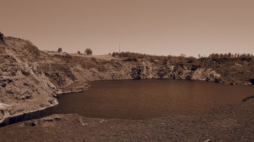 Scenic view of river against clear sky