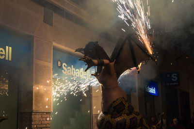 Firework display at night