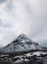 Scenic view of snowcapped mountain against sky