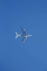 Low angle view of airplane flying in sky