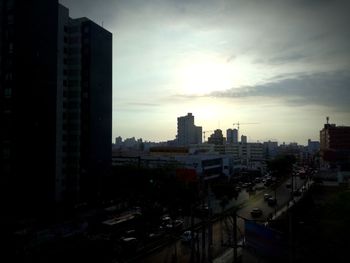 Cityscape against sky during sunset