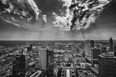 High angle view of buildings in city against sky