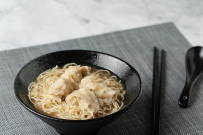 High angle view of noodles in bowl on table