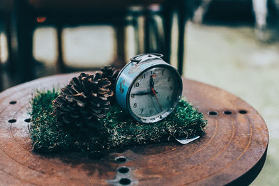 Close-up of clock on table