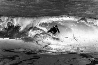 Man surfing in sea