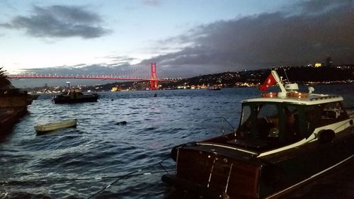 View of bridge in city against sky