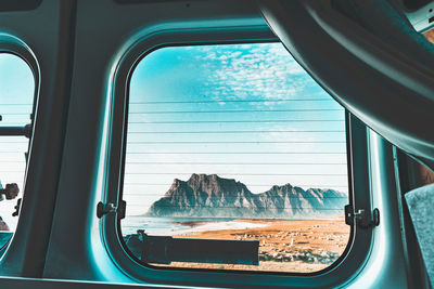 Reflection of sky seen through window