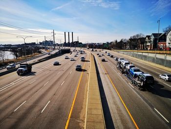 High angle view of vehicles on road in city