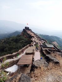 High angle view of buildings on mountain against sky