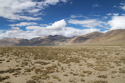 Scenic landscape against cloudy sky