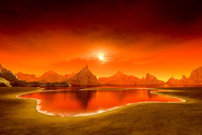 Scenic view of lake against orange sky