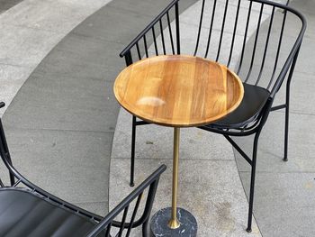 High angle view of empty chairs on table