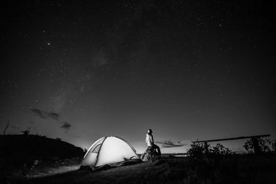 Low angle view of tent against sky at night