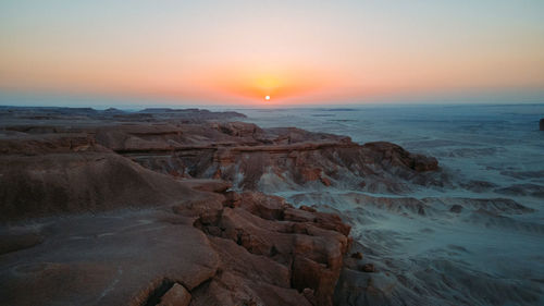 Scenic view of sea against sky during sunset