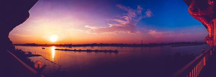 Panoramic view of sea against sky during sunset