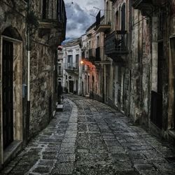 Narrow alley along buildings