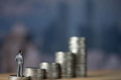 Close-up of coins on table